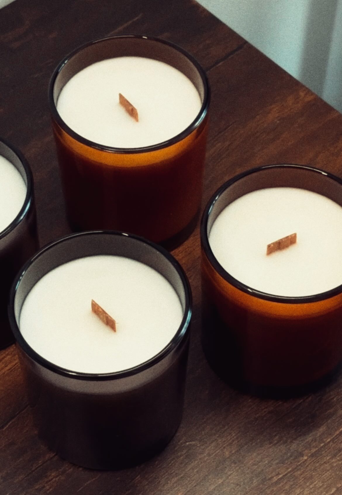 Apple Pie, Pumpkin Soufflé, and Honey Smoke candles together.