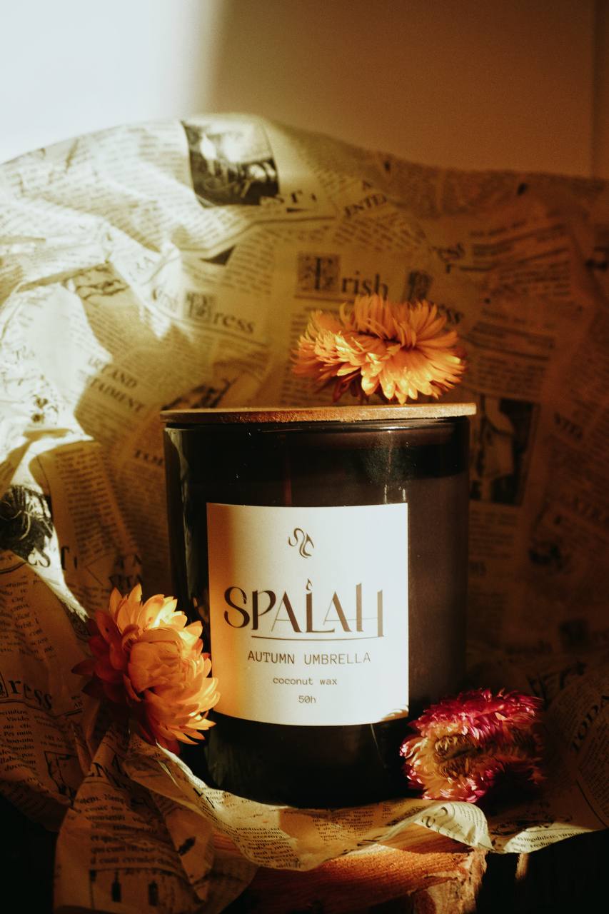 Autumn Umbrella candle set amongst fall foliage and dried flowers